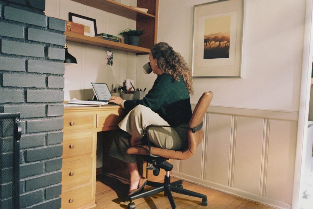 Woman working at task prioritization for entrepreneurs