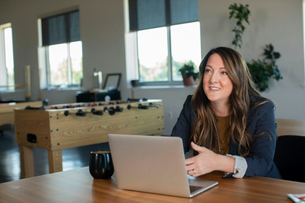 woman in brown cardigan marketing without feeling pushy